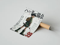 Rolled Anime boy with backpack and fishing rod poster beside its crush-resistant kraft shipping tube
