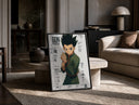 anime boy in fighting stance print in a black frame leaning on a travertine table in a sunlit lounge