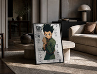 anime boy in fighting stance print in a black frame leaning on a travertine table in a sunlit lounge