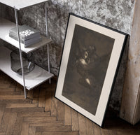 Nightmarish figures with grotesque faces poster in a black frame leaning beside a shelf in a raw-plaster loft