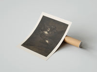Rolled Nightmarish figures with grotesque faces poster beside its crush-resistant kraft shipping tube