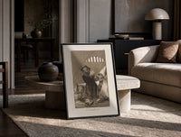 grotesque goblins drinking together print in a black frame leaning on a travertine table in a sunlit lounge
