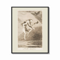 Framed Two witches flying on a broom print shown as a bold statement piece on a clean gallery wall
