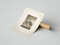 Rolled Man with grotesque mask figures poster beside its crush-resistant kraft shipping tube