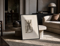 Kneeling woman praying before robed figure print in a black frame leaning on a travertine table in a sunlit lounge