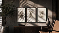 Goya witches flying etchings triptych triptych in three walnut frames above a sideboard in a warm room