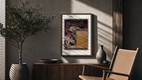 Medieval herald on white horse with trumpet poster framed above a fluted sideboard beside an olive tree