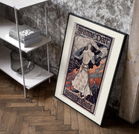 Joan of Arc in armor poster in a black frame leaning beside a shelf in a raw-plaster loft