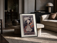 Joan of Arc in armor print in a black frame leaning on a travertine table in a sunlit lounge