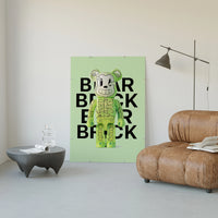 Lime-green skeleton Bearbrick figure poster framed in a luxury living-room setting