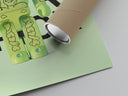 Matte paper-texture close-up of the Glow-in-dark skeleton Bearbrick figure print