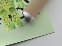 Lime-green skeleton Bearbrick figure print with its crush-resistant shipping tube resting on one corner