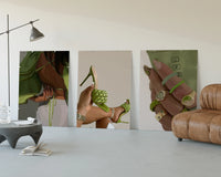 Green Blouse, Heels and Rings Set of 3 displayed beside a brown leather sofa