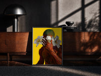Black-framed Green Hair with White Flowers print on the floor in front of a dark wooden console