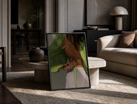 Green Tie-Back Blouse and White Trousers print on the floor, leaning against a travertine table
