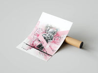 Grey KAWS Companion in abstract chaos with pink paint splashes and a diagonal stripe, print unrolled next to a shipping tube