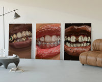 Grillz and Tooth Gems Set of 3 displayed beside a brown leather sofa