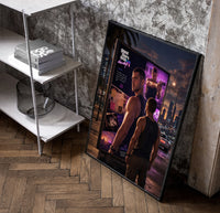 muscular man in tank top poster in a black frame leaning beside a shelf in a raw-plaster loft