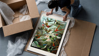 Colorful hummingbirds among tropical foliage framed print being unpacked from protective bubble wrap and a box