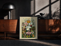 Black-framed Colorful orchid flowers botanical illustration print on a moody console with designer coffee-table books
