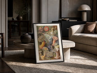 Sea anemones illustration print in a black frame leaning on a travertine table in a sunlit lounge