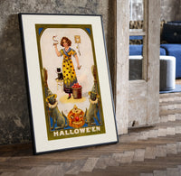 Girl holding snake with black cat print in a black frame leaning beside a vintage door on parquet