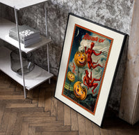 Grinning jack-o-lantern pumpkins with red devils poster in a black frame leaning beside a shelf in a raw-plaster loft