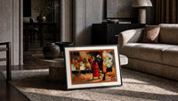 Witch and devils at Halloween feast print in a slim black frame leaning on a travertine coffee table