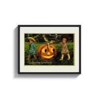 Framed Two children carrying jack-o-lantern pumpkin print shown as a wide statement piece on a clean white wall