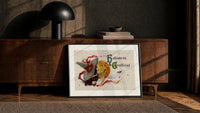 Witch kissing a jack-o-lantern pumpkin print in a black frame leaning against a walnut console in lamplight