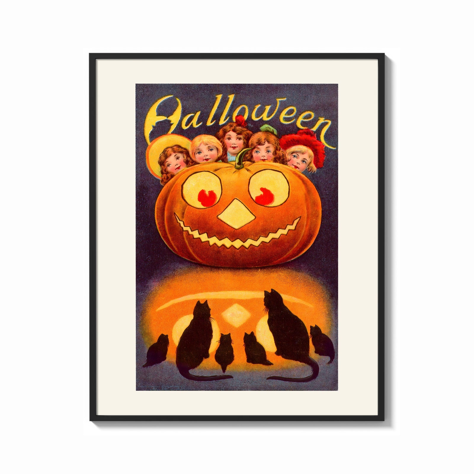 Framed Vintage jack-o'-lantern with children's faces print shown as a bold statement piece on a clean gallery wall