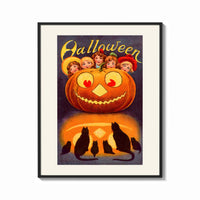 Framed Vintage jack-o'-lantern with children's faces print shown as a bold statement piece on a clean gallery wall