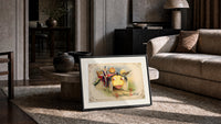 Vintage Halloween vegetable characters in car print in a slim black frame leaning on a travertine coffee table