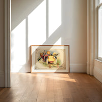 Vintage Halloween vegetable characters in car print in an oak frame on a sunlit wood floor beneath tall window light