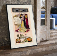 Couple embracing beside grandfather clock print in a black frame leaning beside a vintage door on parquet