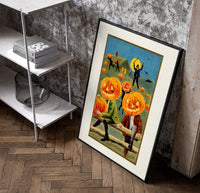 Pumpkin-headed men in vintage suits poster in a black frame leaning beside a shelf in a raw-plaster loft
