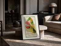 Girl bobbing for apples with cat print in a black frame leaning on a travertine table in a sunlit lounge
