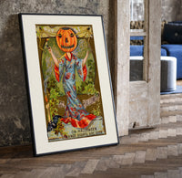 Pumpkin-headed woman in kimono print in a black frame leaning beside a vintage door on parquet
