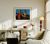 Witch and pumpkin man walking print in an oak frame above a mid-century book console with a vintage radio