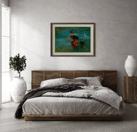 Witch flying on broom with black cat print in a dark wood frame above a rattan bed on a plaster wall