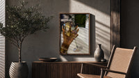 Raised Wine Glass poster framed above a fluted sideboard beside a potted tree
