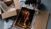 Hand Moving the Queen framed print being unpacked from protective bubble wrap and a box
