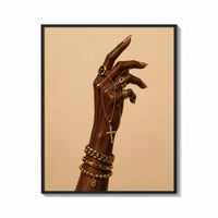 Framed Hand with a Cross and Gold Chains print shown as a bold statement piece on a clean gallery wall