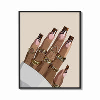 Framed Hand with Brown Swirl Nails print shown as a bold statement piece on a clean gallery wall
