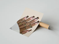 Gently curled Hand with Brown Swirl Nails print beside its protective shipping tube
