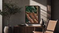 Green French Tips poster framed above a fluted sideboard beside a potted tree