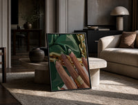 Green French Tips print on the floor, leaning against a travertine table