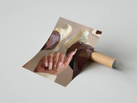 Gently curled Heart Nail Designs print beside its protective shipping tube