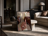 Heart Nail Designs print on the floor, leaning against a travertine table