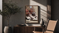 Hands Lacing Brown High-Tops poster framed above a fluted sideboard beside a potted tree